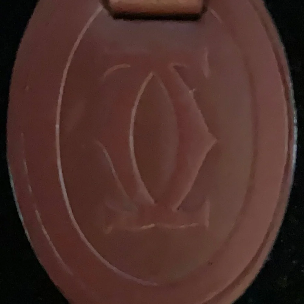 Cartier Elegant Red Leather Keychain with Gold Hardware
